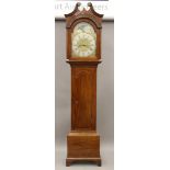 A 19th century mahogany longcase clock, the dial inscribed Jonathan Rowlands Berwick. 225 cm high.