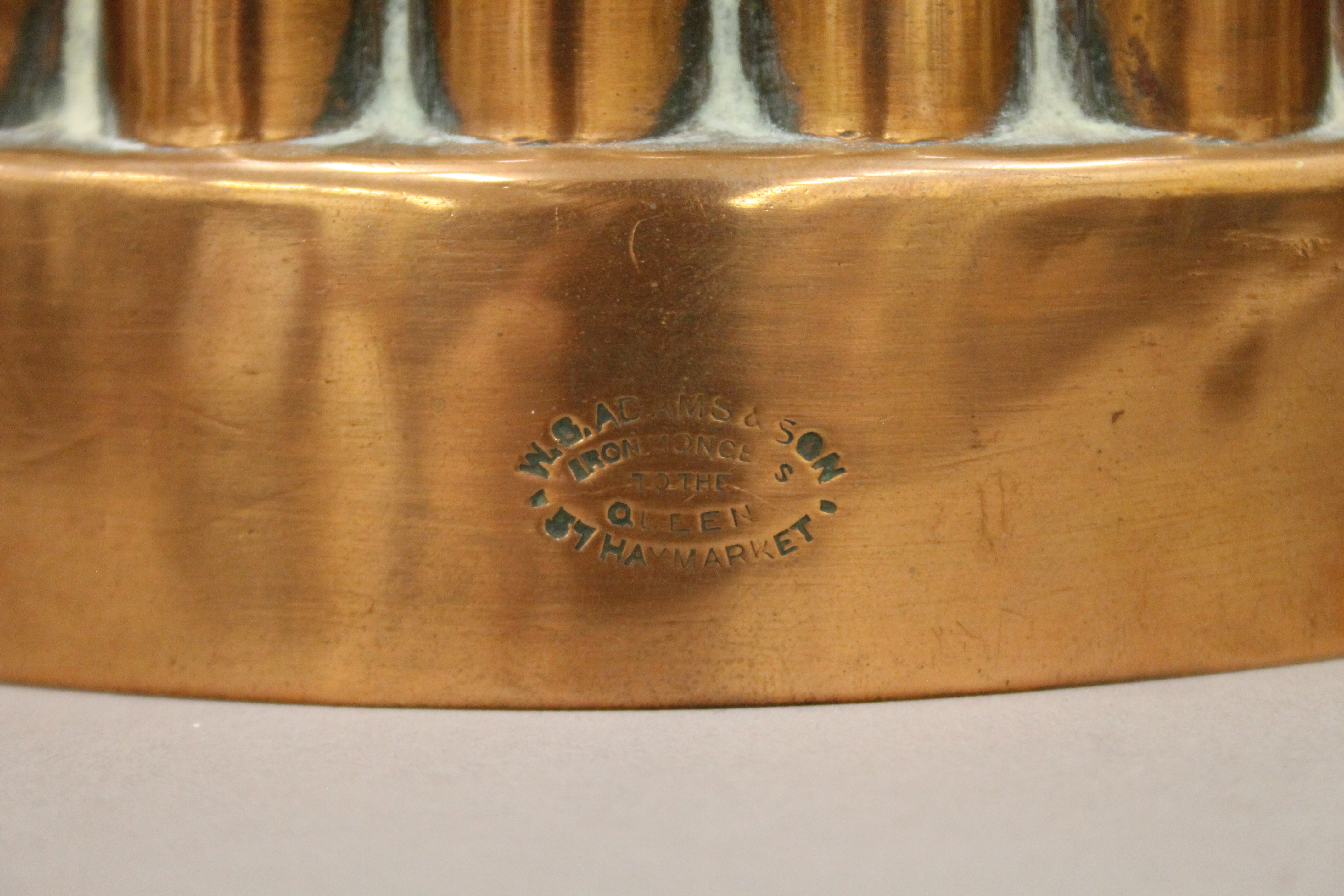 A Victorian copper jelly mould. 16.5 cm long. - Image 3 of 4