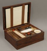 A 19th century mahogany gentleman's travelling box. 28.5 cm high.