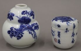 A Chinese blue and white water dropper; together with a blue and white pot with Chinese inscription.