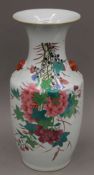 A large late 19th/early 20th century Chinese porcelain vase. 42.5 cm high.