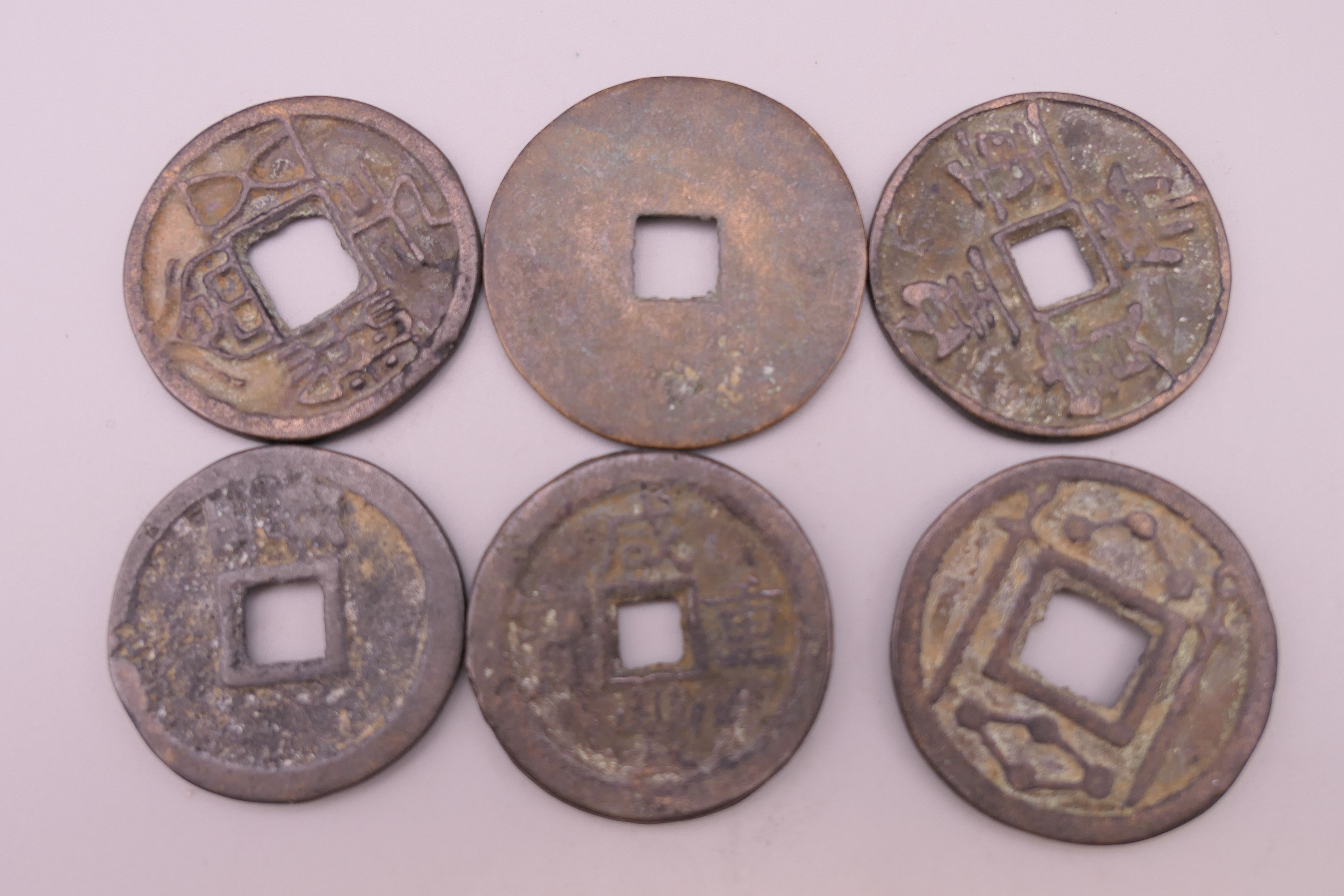 Six Chinese coins. Largest 3.5 cm diameter. - Image 2 of 2