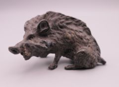 A cold painted bronze model of a boar. 6 cm long.