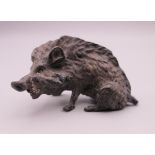 A cold painted bronze model of a boar. 6 cm long.