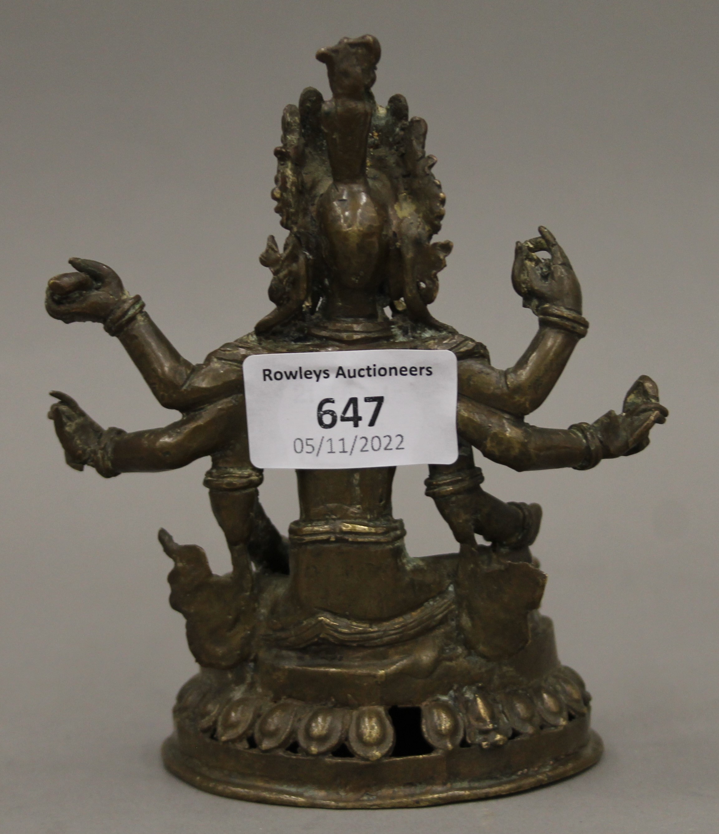 A small antique Tibetan six armed bronze figure of Buddha. 13.5 cm high. - Image 3 of 4