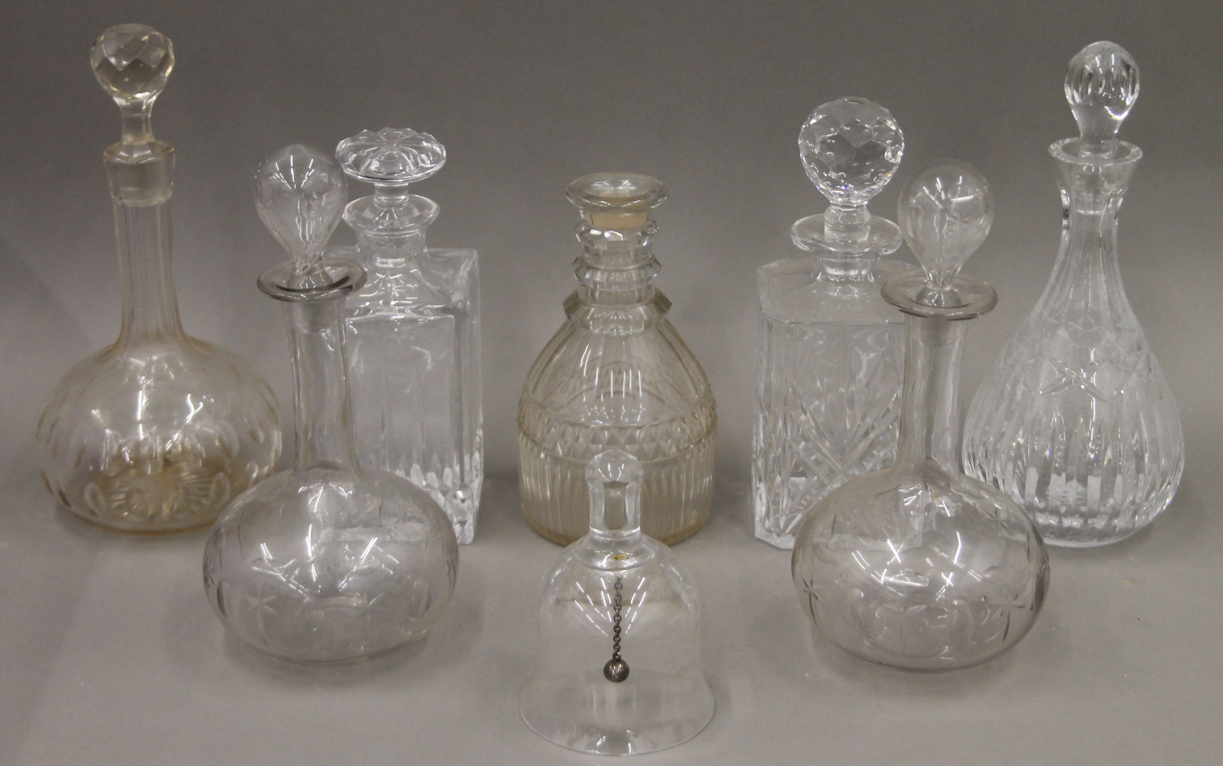 Two boxes of antique glass decanters, etc.