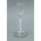 An 18th/19th century air twist stem glass. 16 cm high.