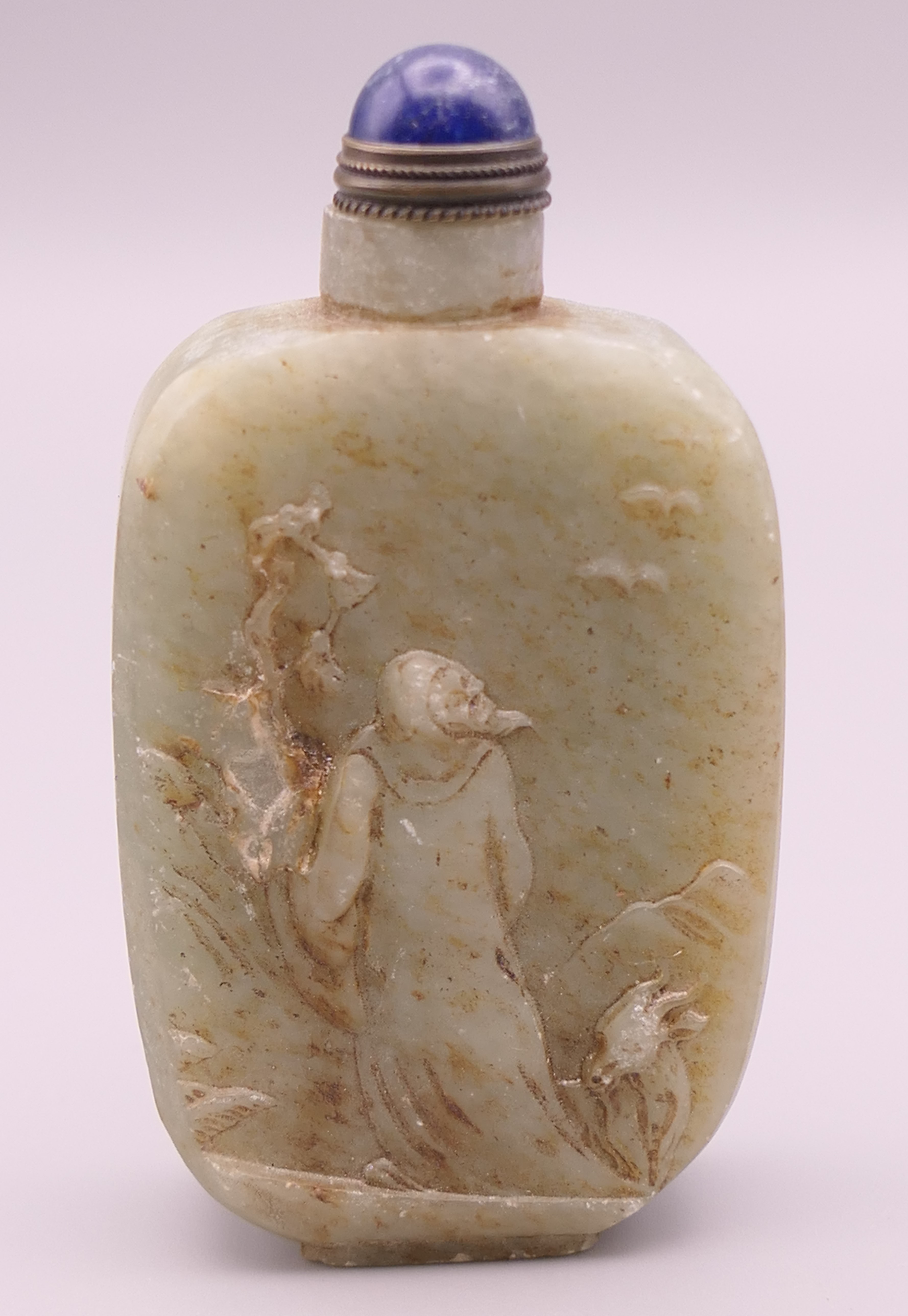 A jade snuff bottle. 7.5 cm high.