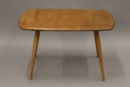 A blonde Ercol coffee table. 72 cm long.
