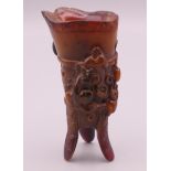 A small libation cup. 9.5 cm high.