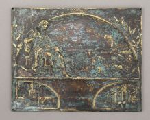 A small bronze plaque. 12 cm wide.