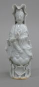 An 18th/19th century blanc de chine model of Guanyin. 14 cm high.