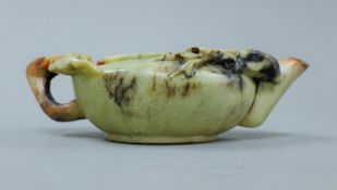 A Chinese carved soapstone tea pot. 15.5 cm long.