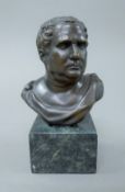 A bronze male bust. 13.5 cm high.