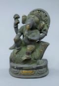 A bronze model of Ganesh. 11 cm high.