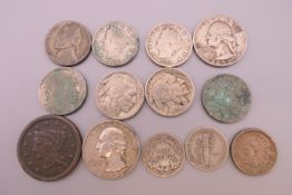 A small quantity of various coins. Largest 2.75 cm diameter.
