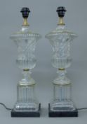 A pair of glass urn lamps with marble bases. 59 cm high.