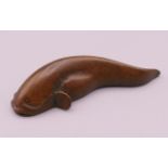 A bronze model of a catfish. 6 cm long.