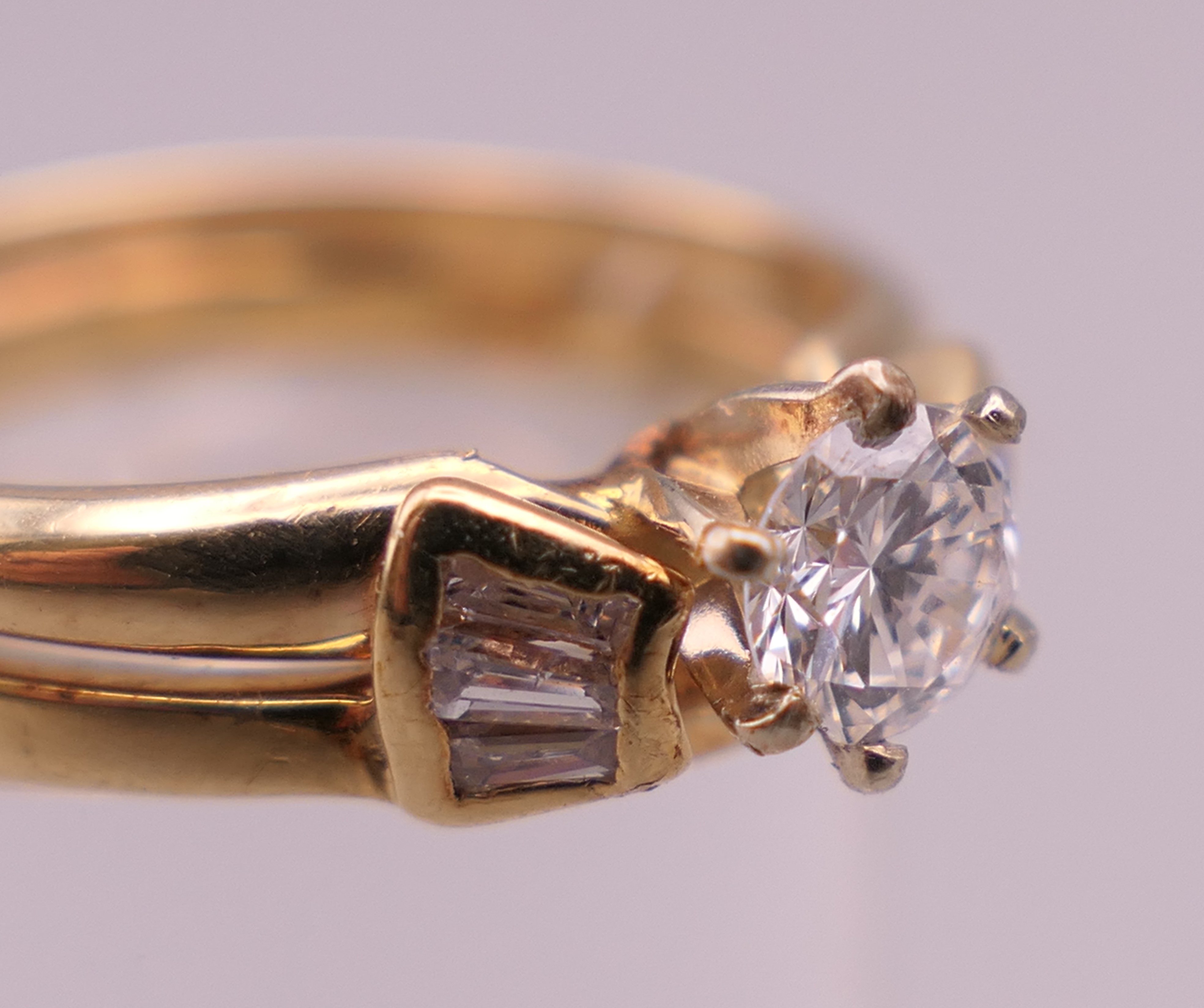 A 14 ct gold diamond solitaire ring. Ring size K/L. 3.2 grammes total weight. - Image 2 of 5