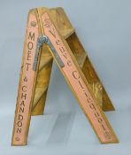 A wooden champagne ladder. 86.5 cm high.