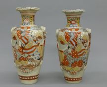 A pair of late 19th century Satsuma vases. 31 cm high.