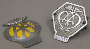 Two vintage AA car badges.