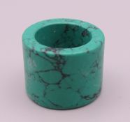 A turquoise archer's ring. 2.5 cm high, 3.25 cm diameter.