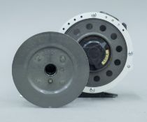 A Mitchell 710 Automatic fly reel with spare spool.