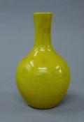 A Chinese yellow porcelain vase. 17 cm high.