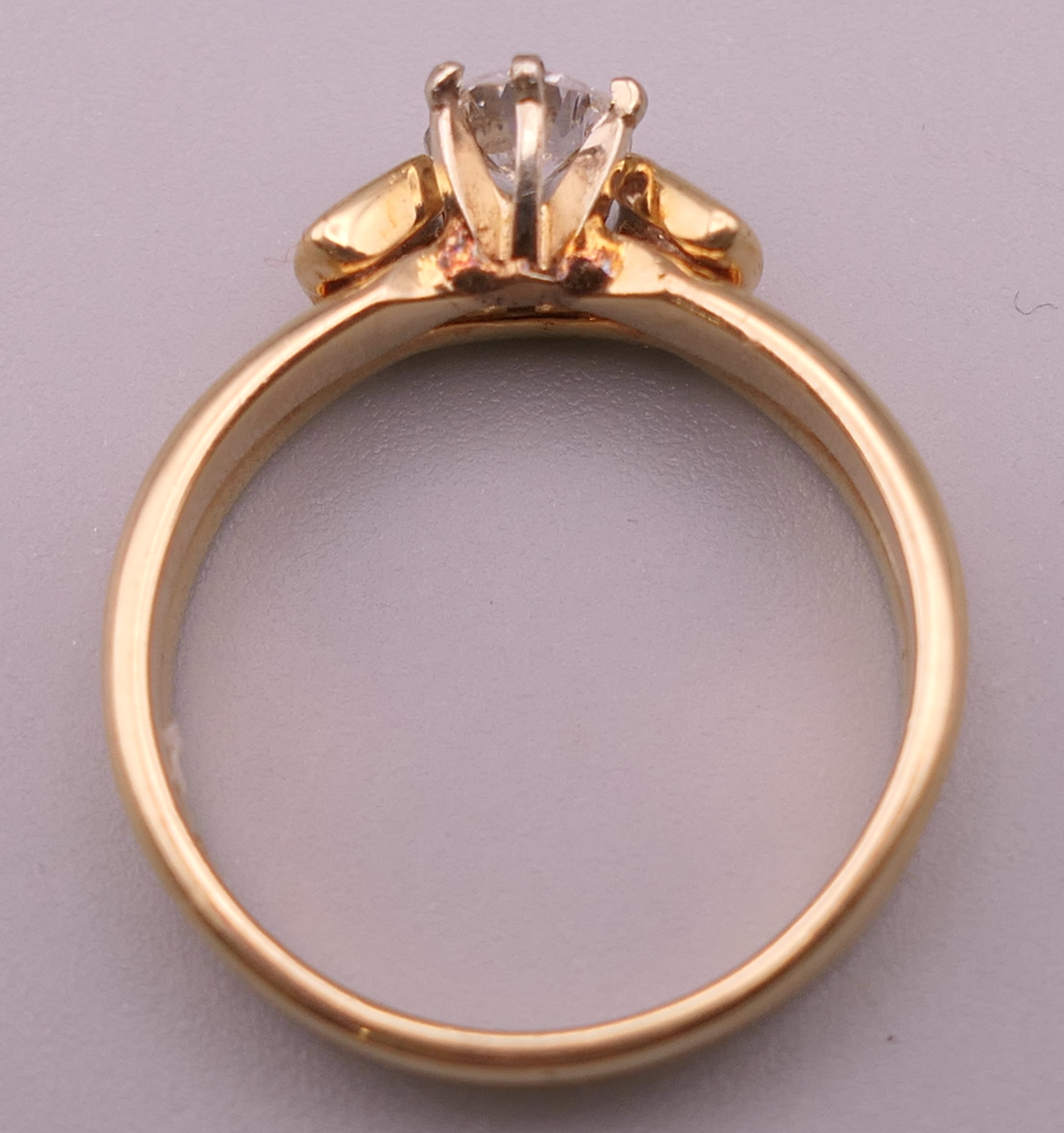 A 14 ct gold diamond solitaire ring. Ring size K/L. 3.2 grammes total weight. - Image 3 of 5