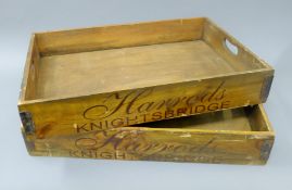 A pair of large wooden Harrod's trays. 65 cm long.