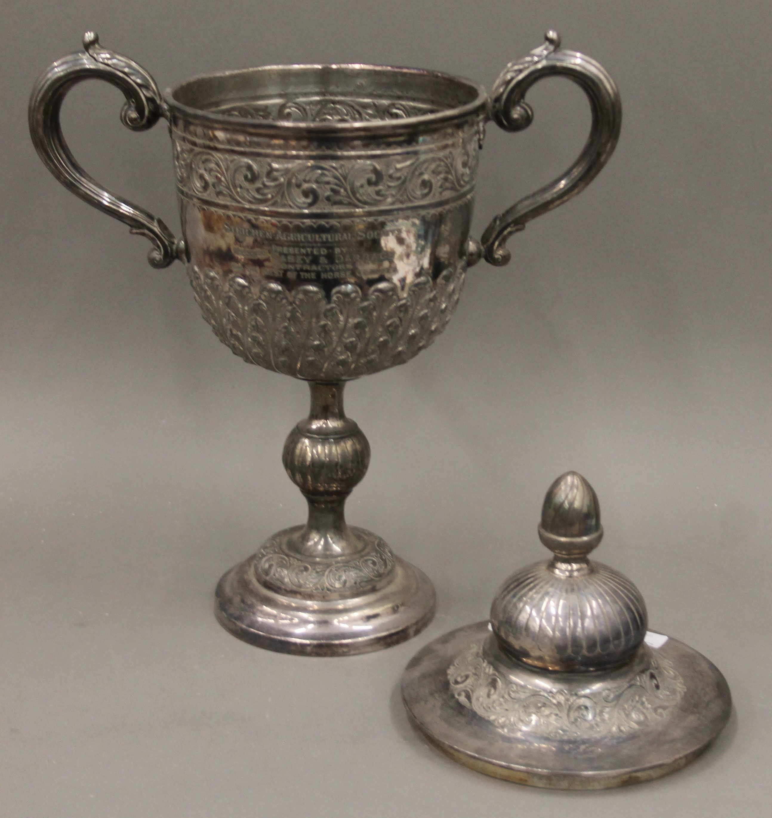 A silver plated lidded trophy cup. 45 cm high. - Image 6 of 6