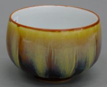 A Chinese drip glazed pottery bowl. 7.5 cm diameter.