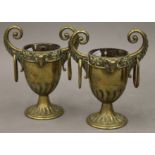 A pair of Victorian brass vases. 17.5 cm high.