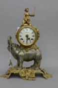 A cast metal elephant form mantle clock. 41 cm high.