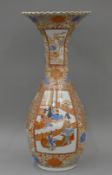 A large 19th century Japanese kutani porcelain floor vase. 77 cm high.