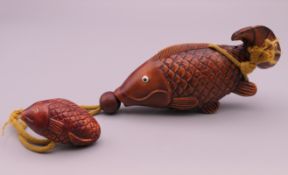 An inro formed as a fish. Large fish 11.5 cm long.