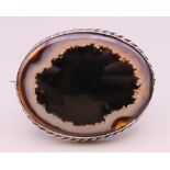 A silver mounted agate brooch. 7 cm x 5.5 cm.