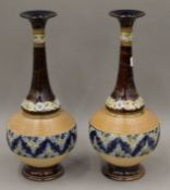 A pair of large Doulton Lambeth vases. 39.5 cm high.