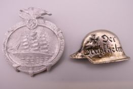 Two Nazi badges. Largest 4.5 cm x 4 cm.