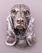 A silver dog form brooch. 3.5 cm high.
