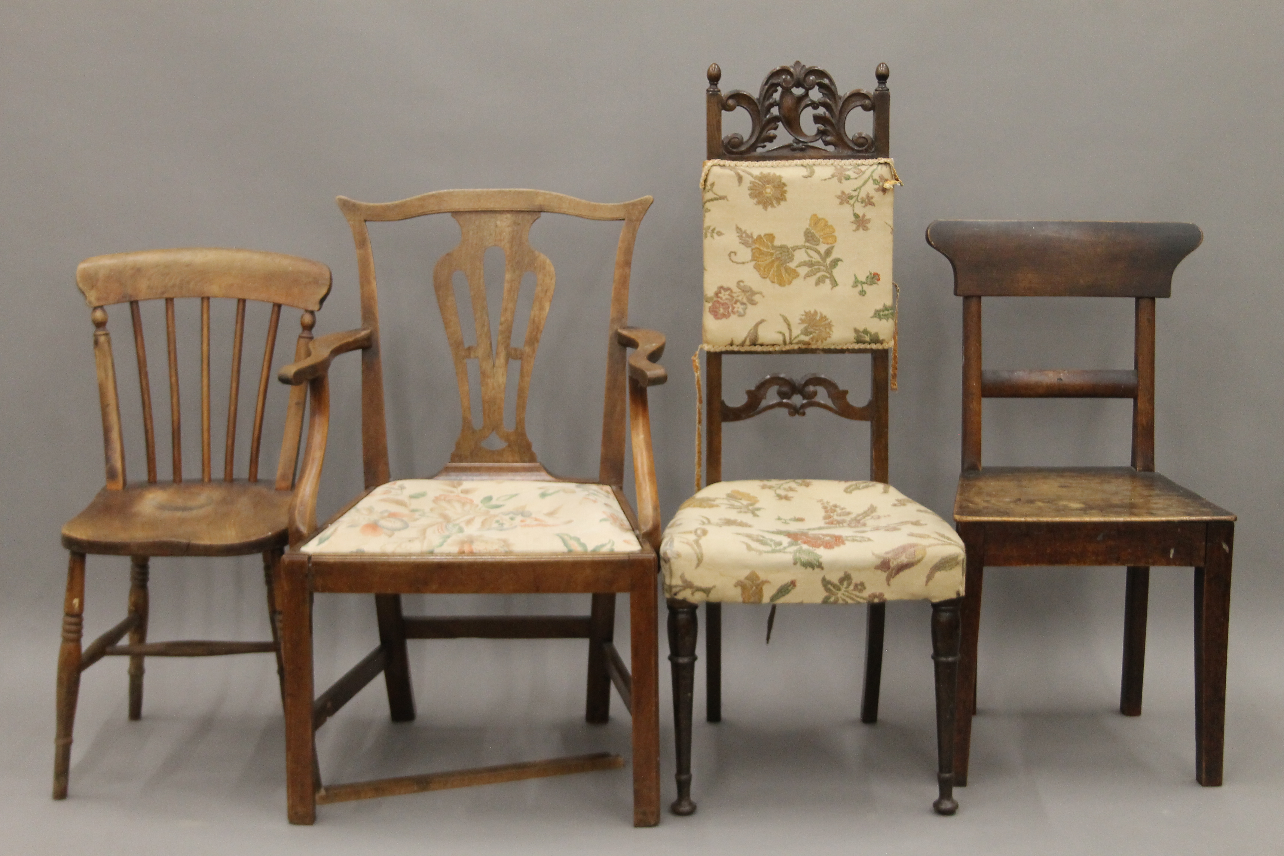 A 19th century mahogany open arm chair and three other various chairs. The former 62 cm wide.