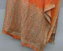 A large paisley shawl.