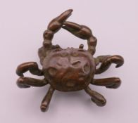 A bronze model of a crab. 5.5 cm wide.