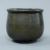 A silver inlaid bronze censer. 10 cm high.