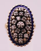 An antique 18 ct gold enamel and diamond ring. Ring size M.