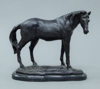 A bronze model of a horse. 22.5 cm high.