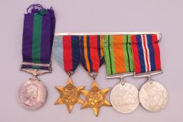 A set of WWII medals (Defence Medal, 1939-45 War Medal,