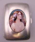A silver cigarette case decorated with a bust of a young woman. 8 cm x 6 cm. 71.