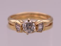 A 14 ct gold diamond solitaire ring. Ring size K/L. 3.2 grammes total weight.